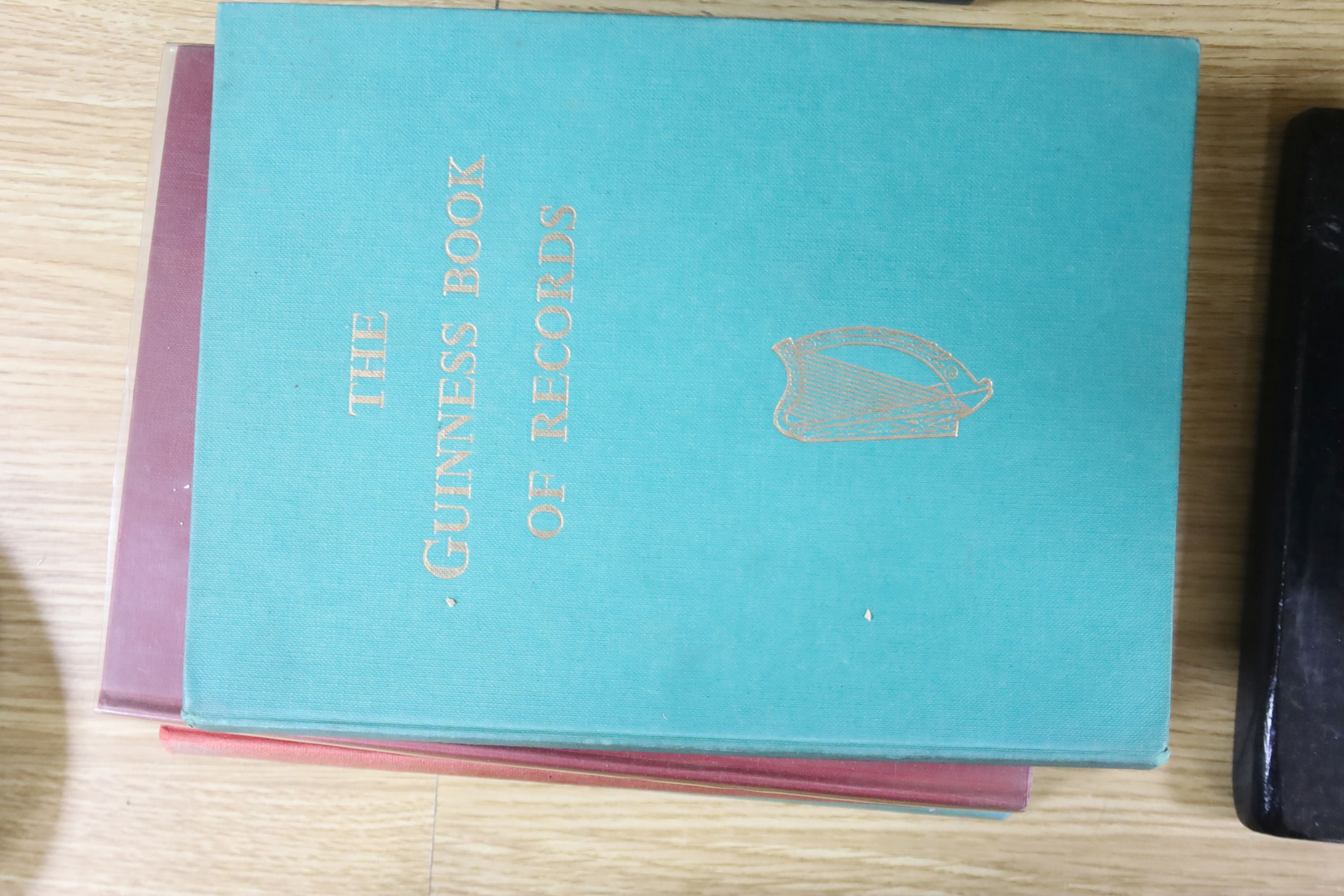 A Guiness Book of Records rare first edition 1955, first impression and nine others, together with a framed Guiness Book of Records Certificate dated 1st March 1994